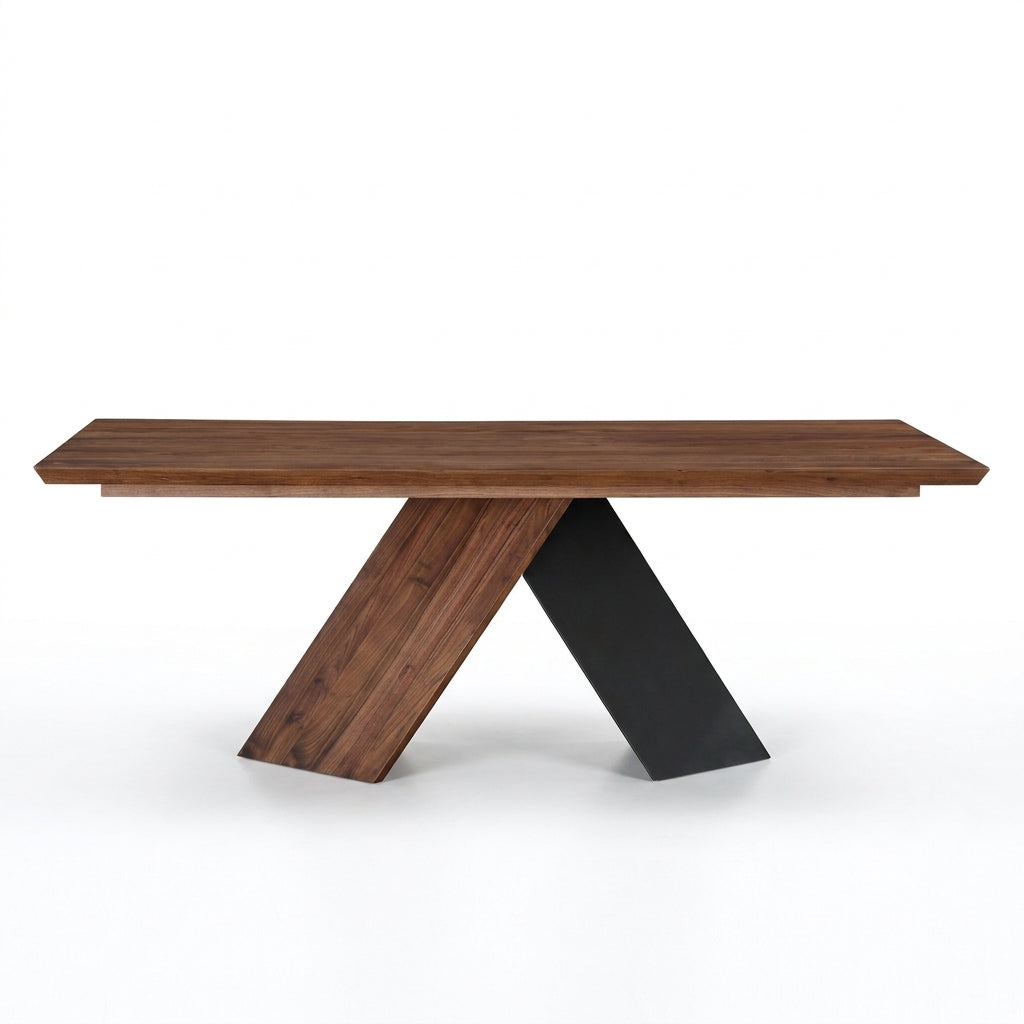 A modern rectangular dining table with a dark brown wood grain top and a sculptural X-shaped base made of two angled legs, one in dark brown wood and the other in matte black metal, shown on a white background.