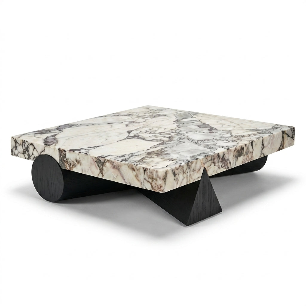 Marble coffee table with black legs on a white background