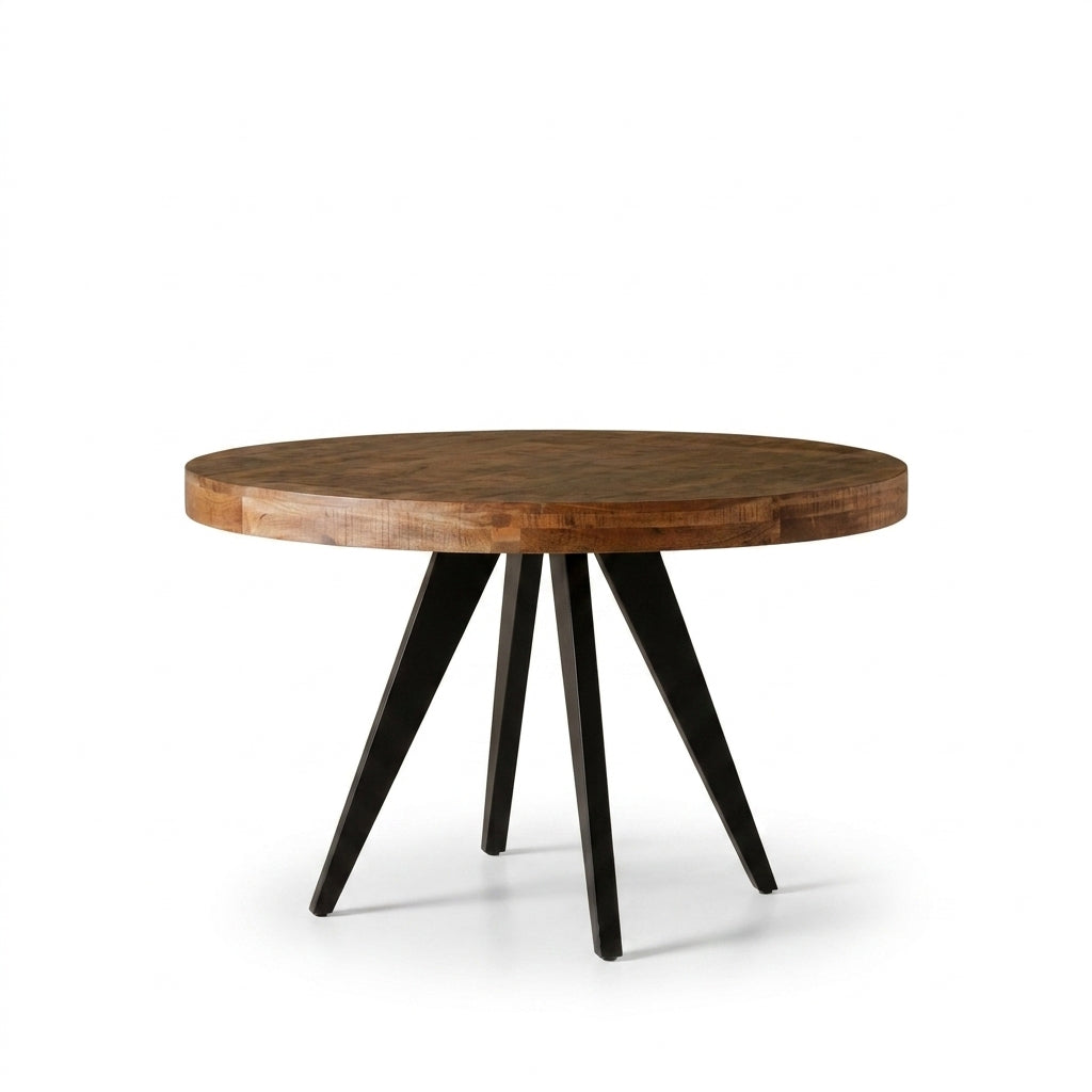 A round wooden dining table with a warm medium-brown wood grain top and three black metal angled legs, shown on a clean white background.
