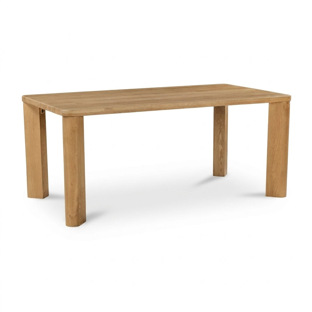 A minimalist rectangular wooden table with four thick block legs, shown on a clean white background.