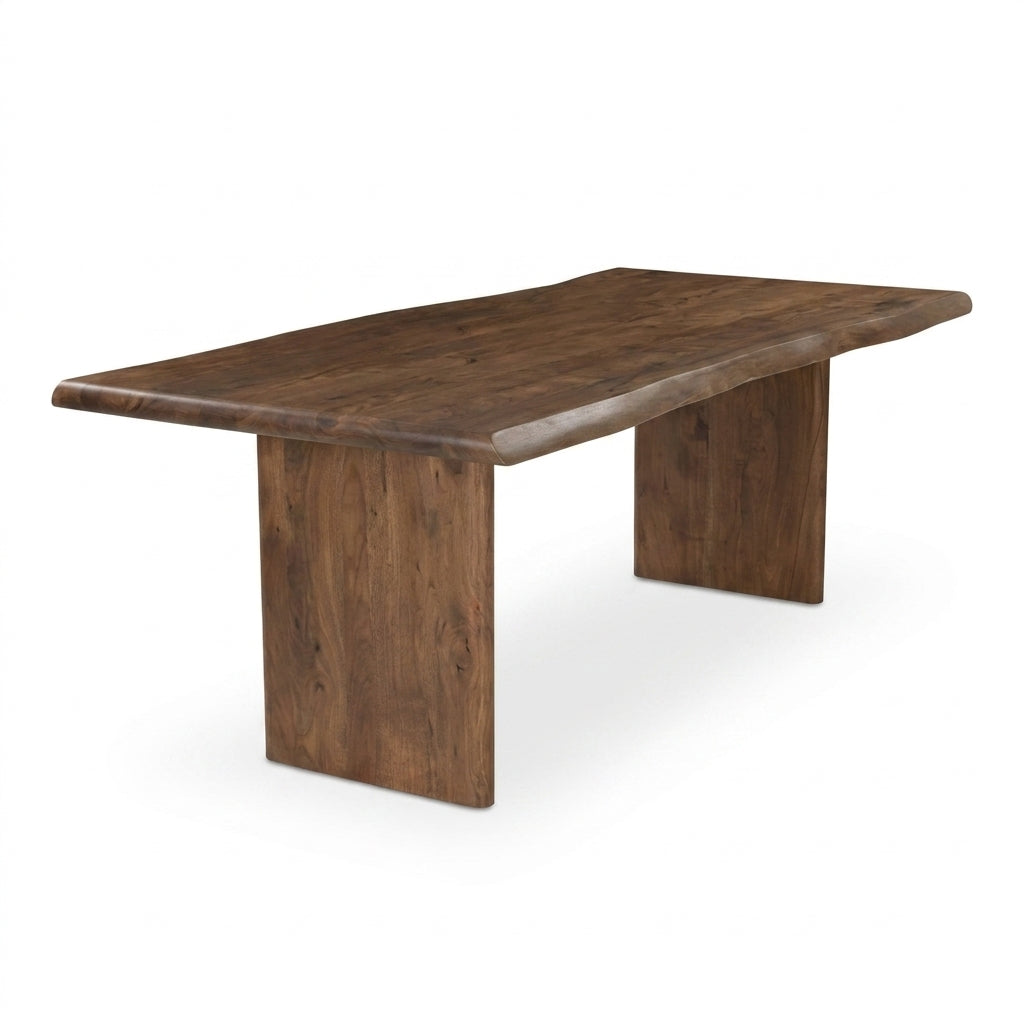 A rustic live-edge wooden dining table with a thick rectangular top and two thick block-style legs, shown on a plain white background.
