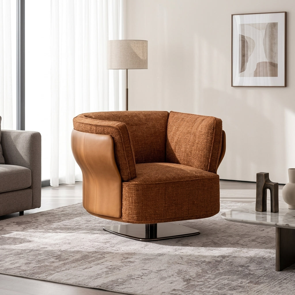 Brown armchair in a modern living room with a lamp and abstract art on the wall.