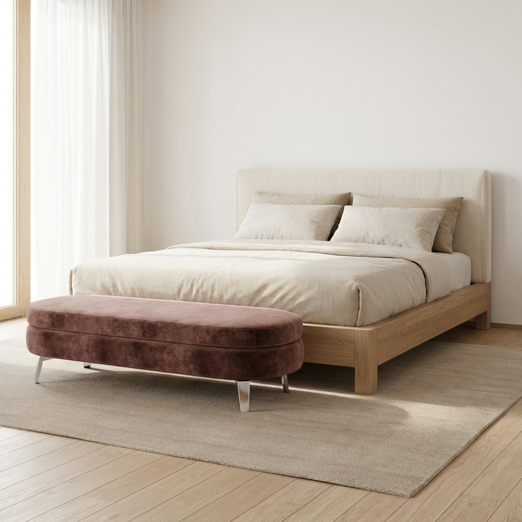 Modern living room with a beige sofa, coffee table, and decorative elements.