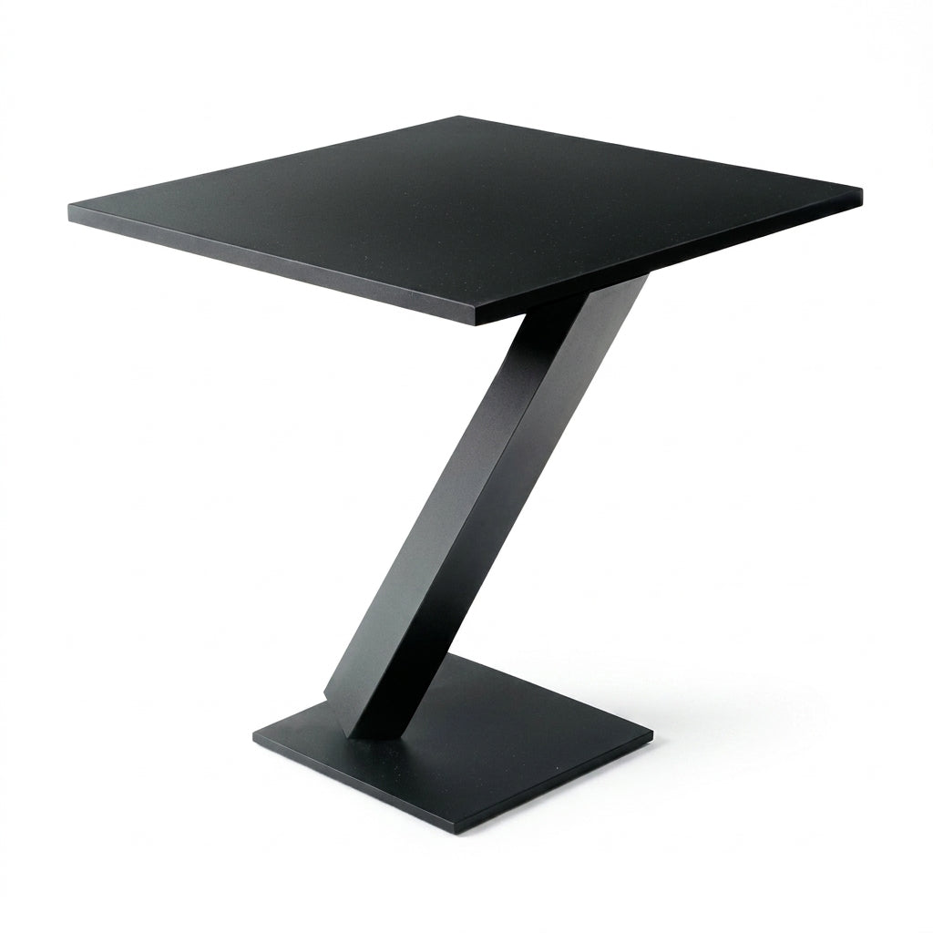 Black square table with a unique Z-shaped leg design on a white background