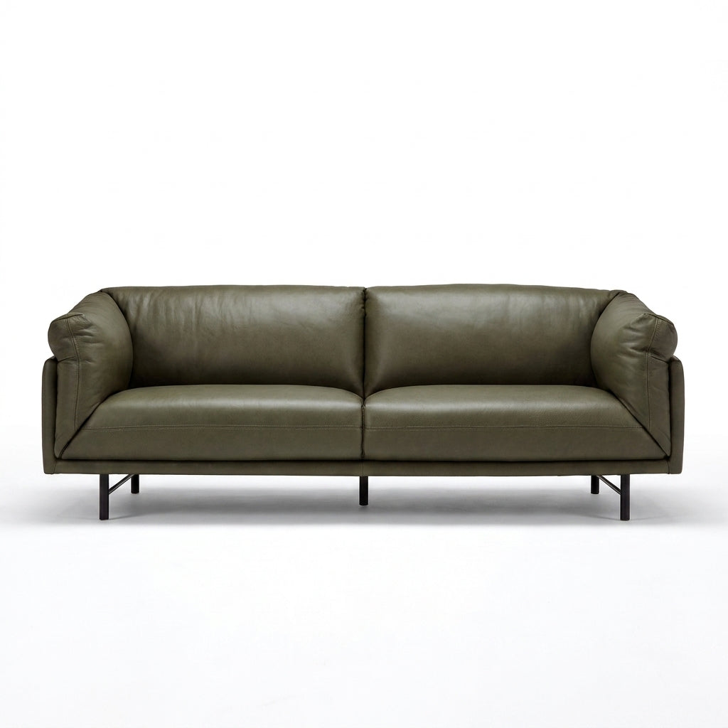 An olive green leather loveseat sofa with a low black metal frame and legs, shown from a front-facing perspective on a white background.