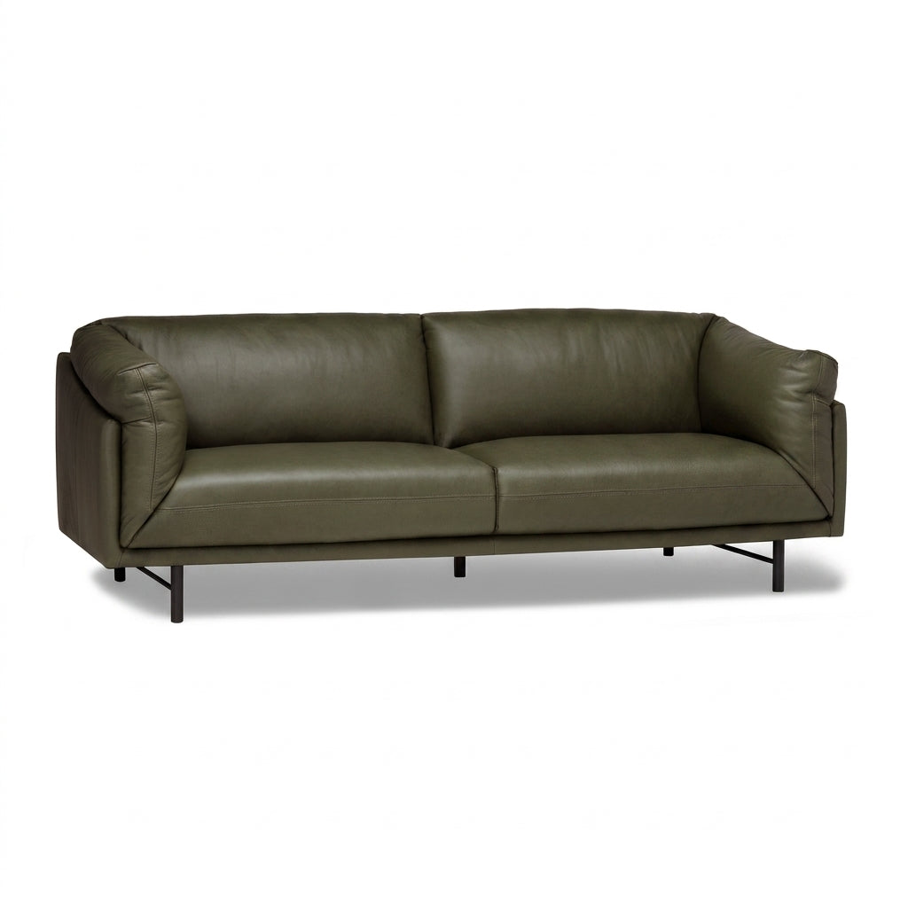 An olive green leather loveseat sofa with a low black metal frame and legs, shown against a plain white background.