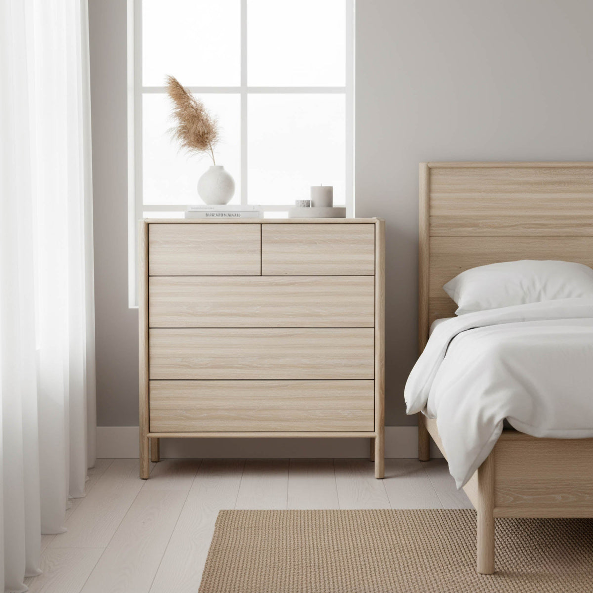 Ridgeline 5 Drawer Chest in Light Oak, styled in a bedroom