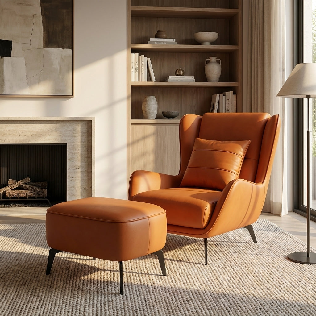 Orange leather armchair with matching ottoman in a living room setting.
