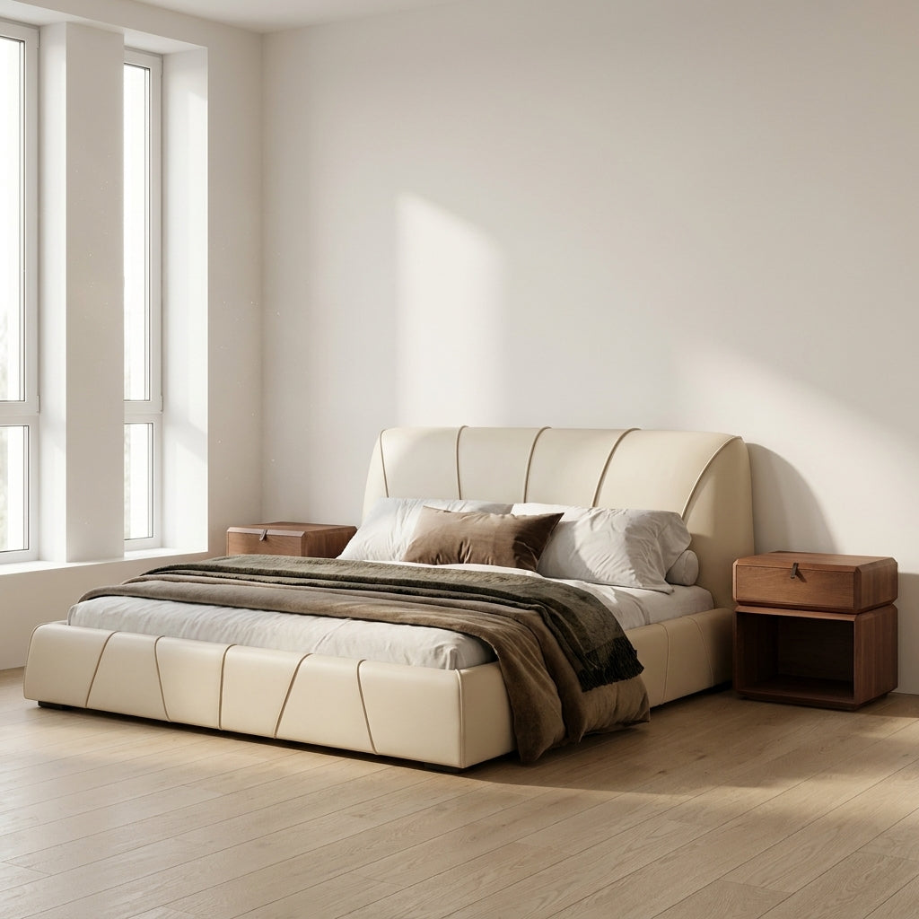 Beige upholstered bed with wooden nightstands in a bright bedroom