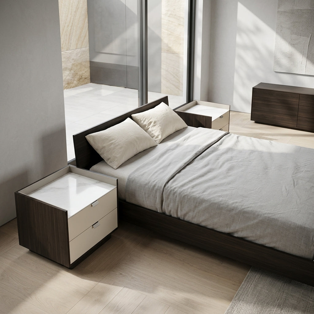 Modern bedroom with a bed and nightstands in a well-lit room.