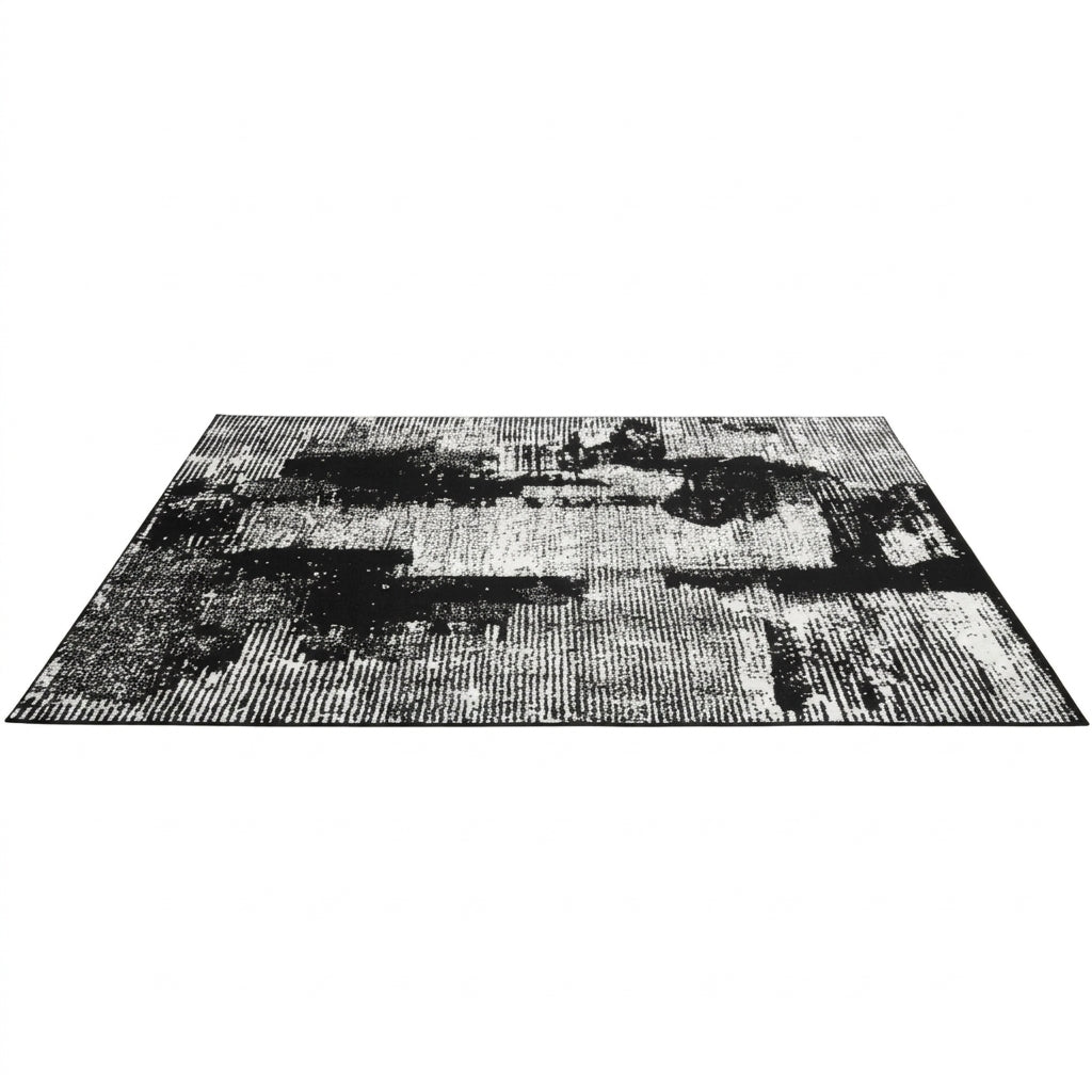 Black and white patterned rug on a white background