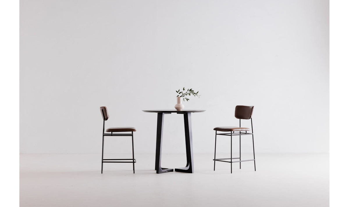 Gisborne Counter Table in Black, styled in a living room, view 2