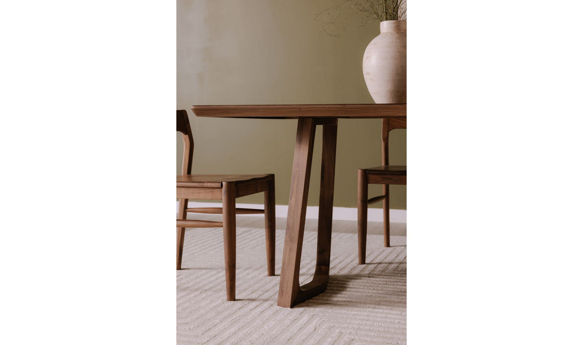 Stow Dining Table in Walnut Brown, styled in a living room, view 2