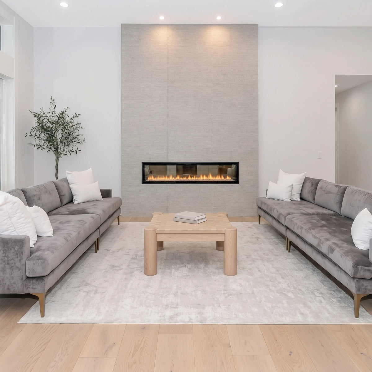 Cartmel Coffee Table, square checkerboard oak coffee table between two grey sofas by a fireplace