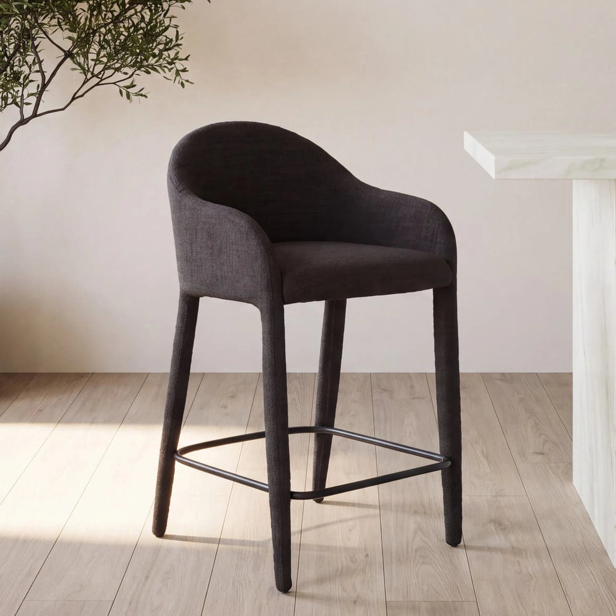 Marvao Counter Stool in Black, styled in a living room