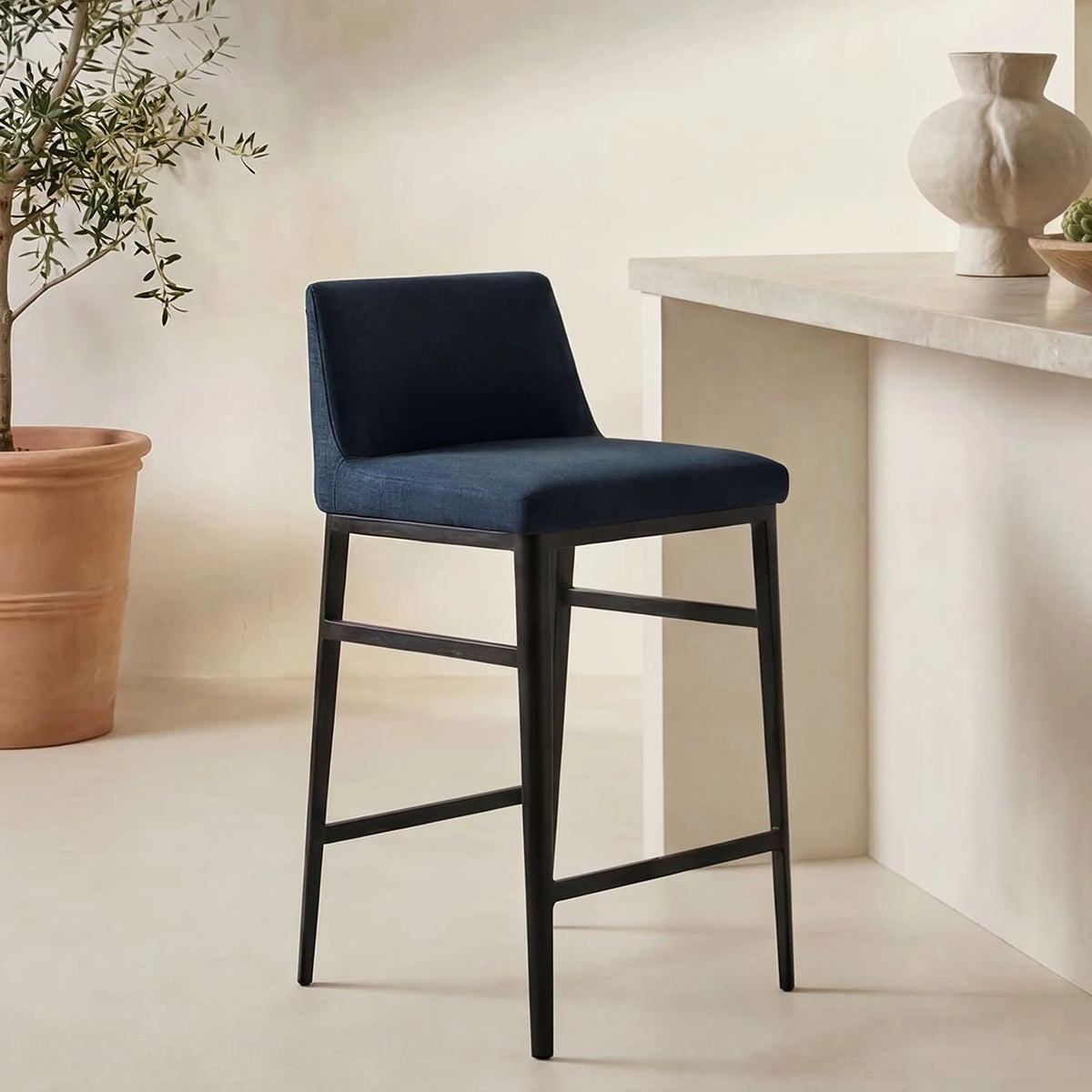 Bolsena Counter Stool in Blue, styled in a living room
