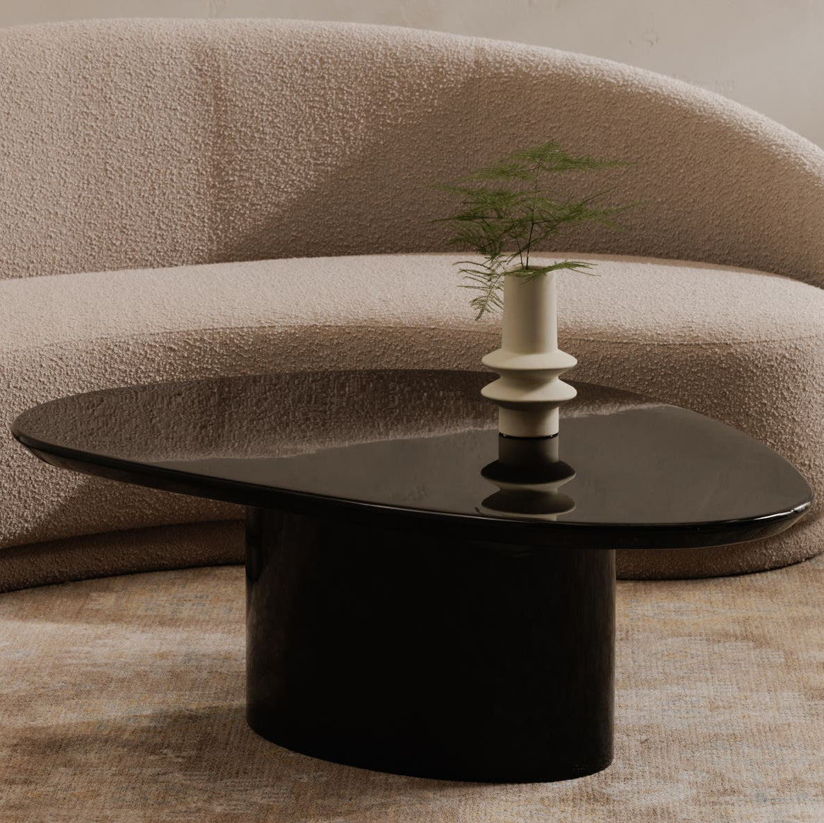 Ennis Coffee Table Black Lacquer in Black — styled in a living room