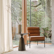 Sirmione Accent Table in Charcoal Grey — styled in a living room