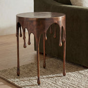 Cavan Accent Table in Antique Copper — styled in a living room