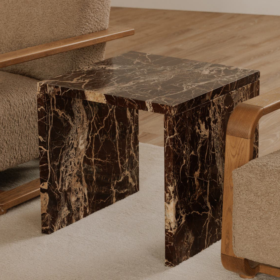 Riomaggiore Accent Table in Rosso Levanto Marble — styled in a living room