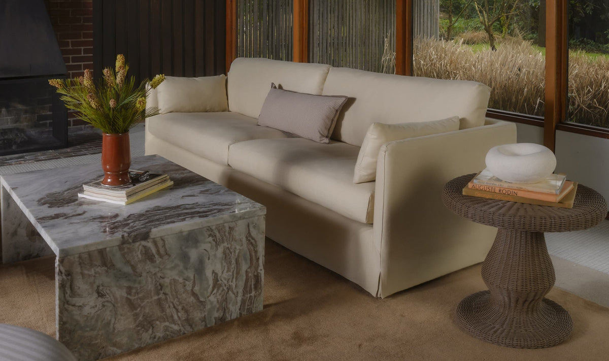 Riomaggiore Coffee Table in Torrento Marble — styled in a living room