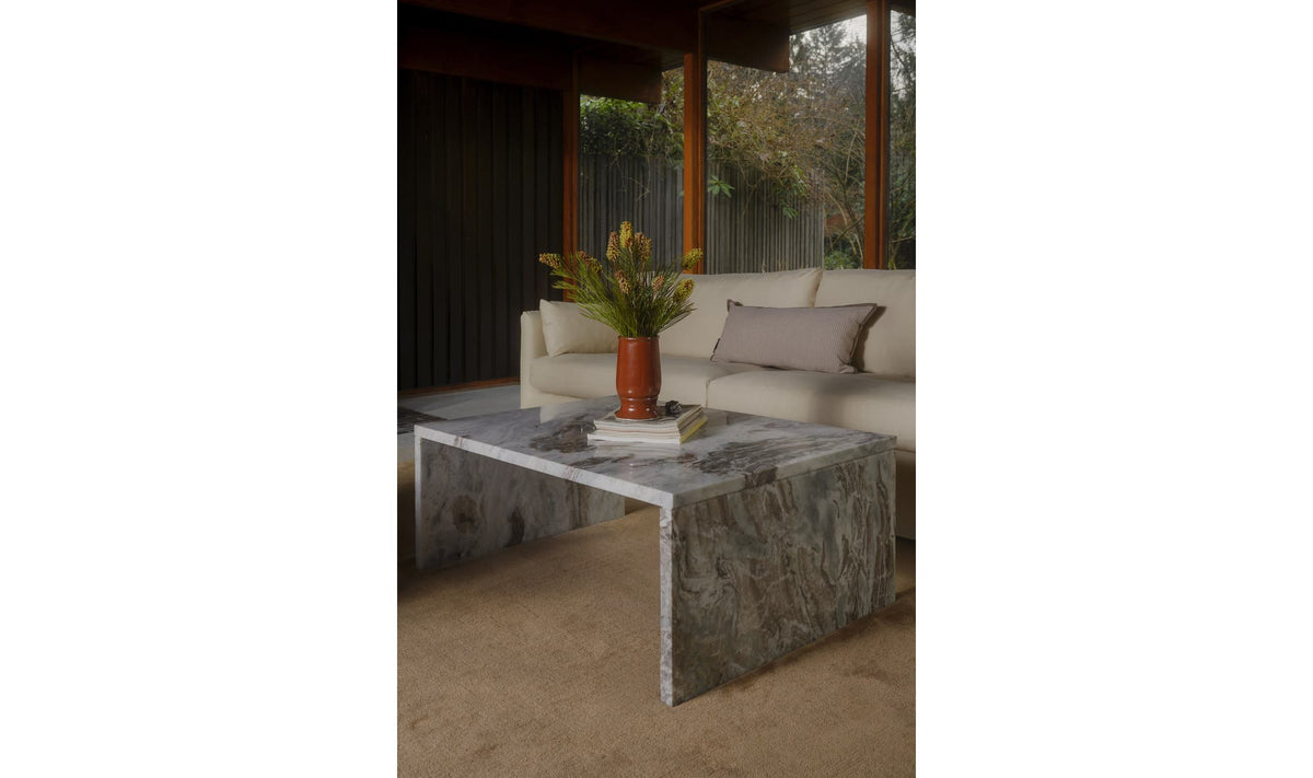 Riomaggiore Coffee Table in Torrento Marble — styled in a living room