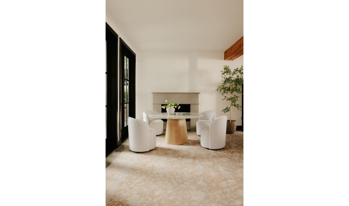 Enfield Dining Table in Onyx Marble, styled in a living room, view 2
