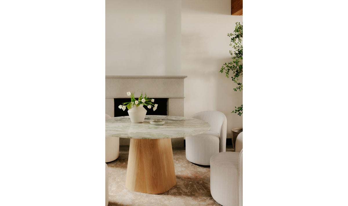 Enfield Dining Table in Onyx Marble, styled in a living room, view 3