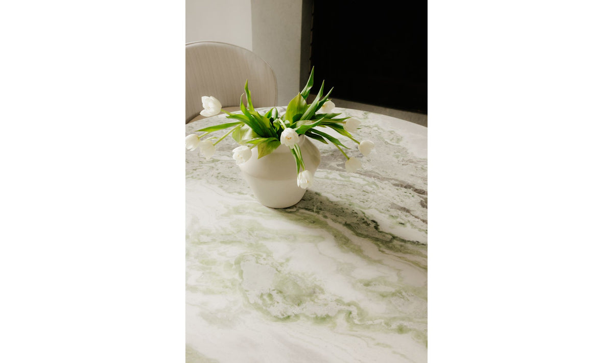 Enfield Dining Table in Onyx Marble, styled in a living room, view 4