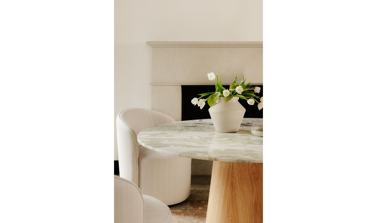 Enfield Dining Table in Onyx Marble, styled in a living room, view 7
