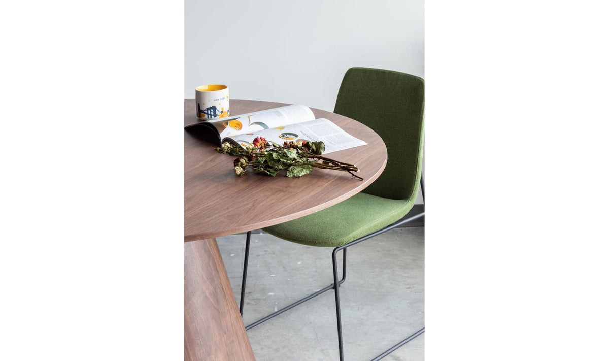 Oban Dining Table in Walnut, styled in a living room, view 2