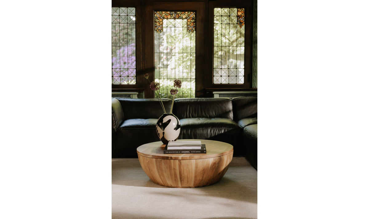 Emden Coffee Table in Natural — styled in a living room