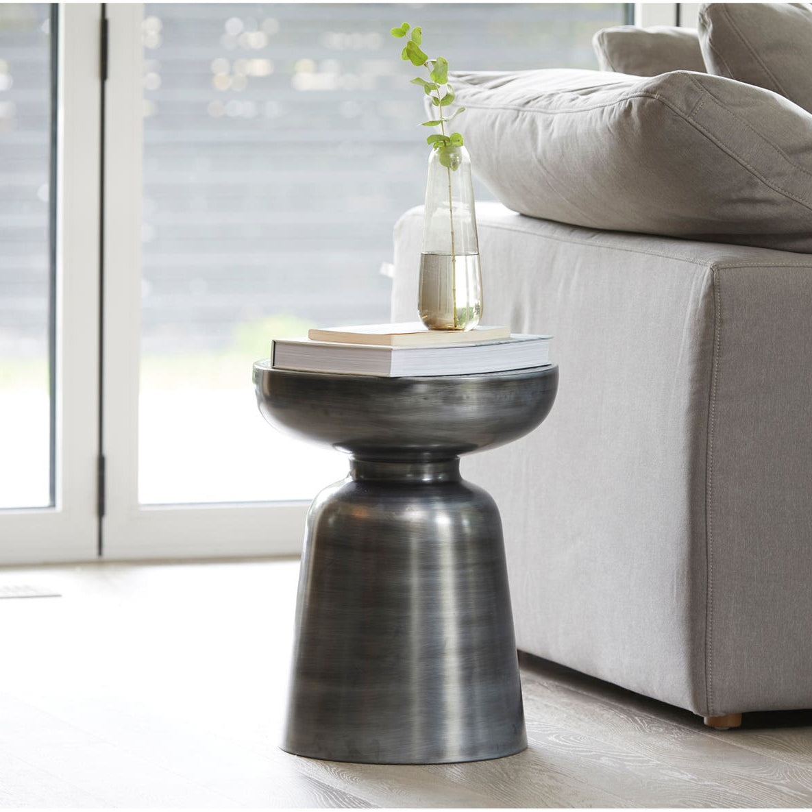 Aarau Accent Table in Antique Nickel — styled in a living room
