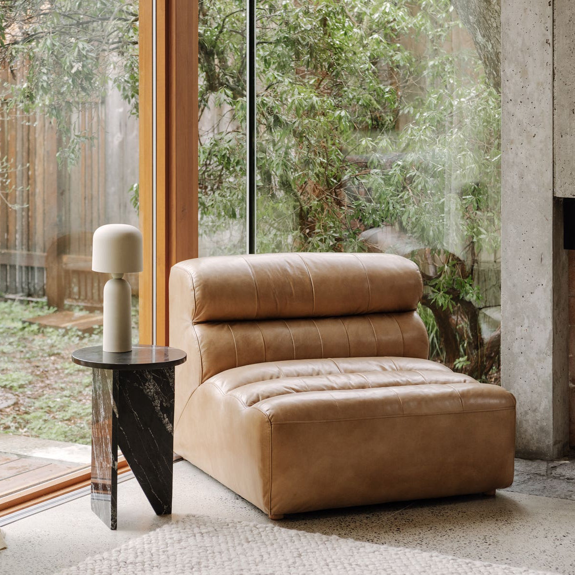 Grasse Accent Table in Black Marble — styled in a living room
