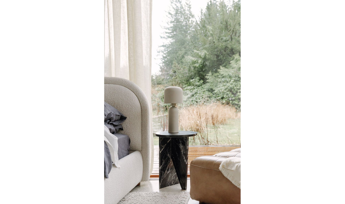 Grasse Accent Table in Black Marble — styled in a living room
