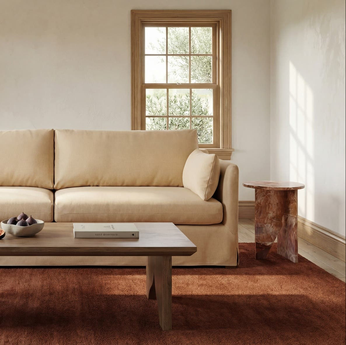 Grasse Accent Table in Orange Levante Marble — styled in a living room