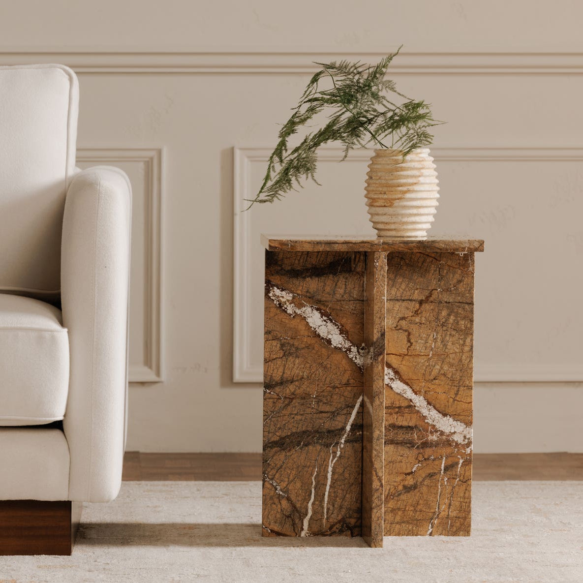 Burnley Accent Table in Golden Forest Marble — styled in a living room