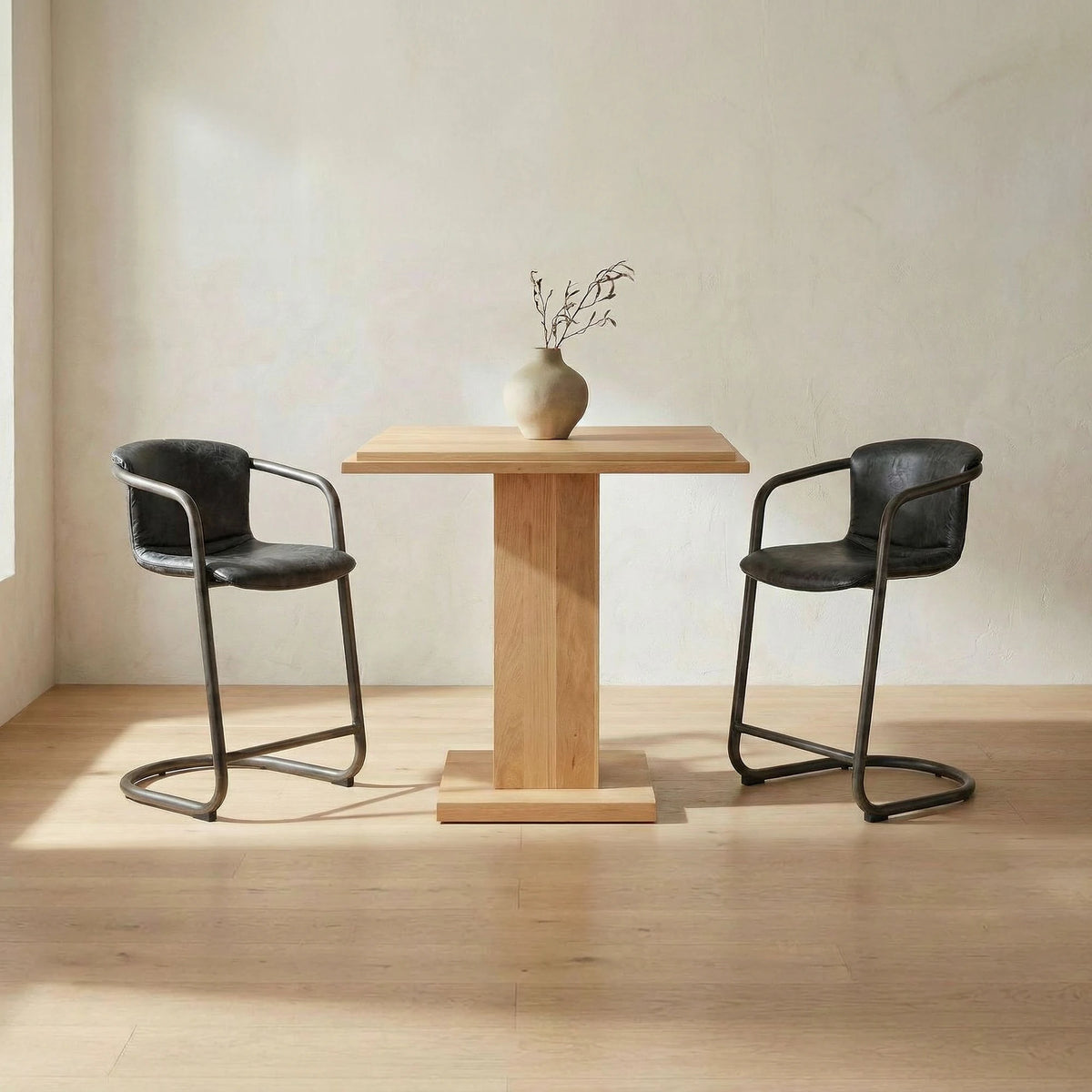 Fougeres Bar Stool Set of Two in Onyx Black Leather, styled in a living room