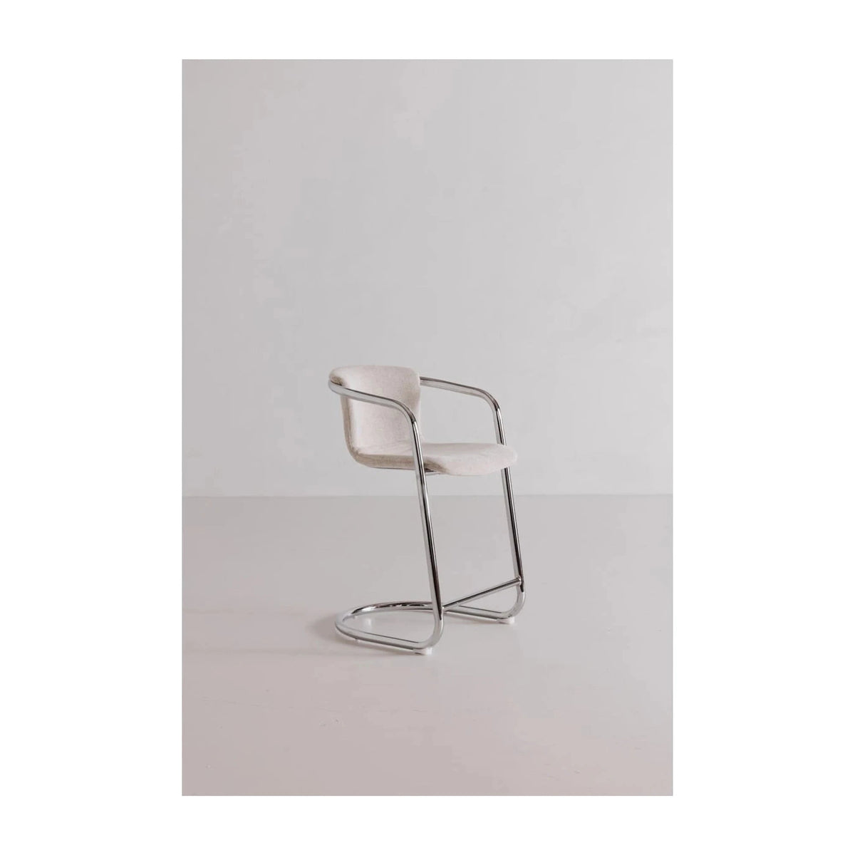 Fougeres Chrome Frame Counter Stool Set of Two in Blended Cream, styled in a living room