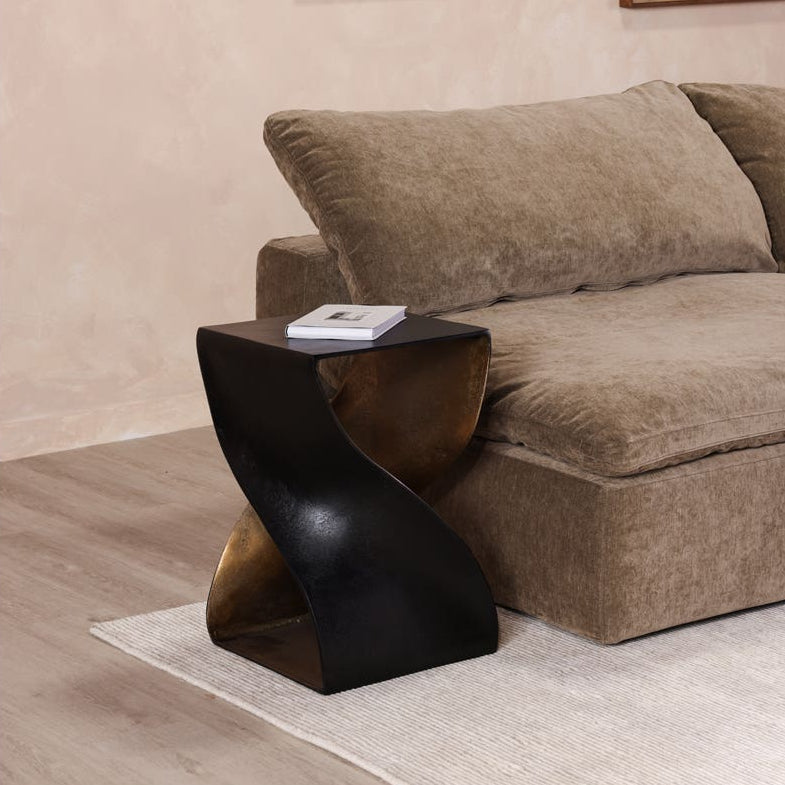 Thurso Accent Table in Black — styled in a living room