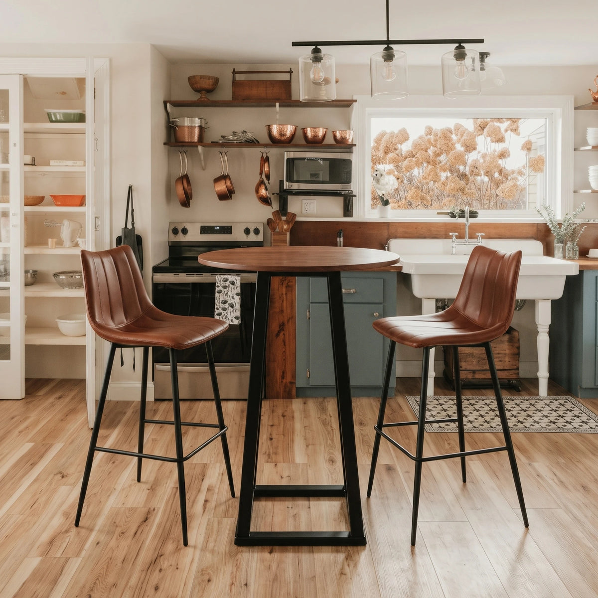 Thame Bar Table with 2 Arlo cognac leather bar stools in a farmhouse kitchen