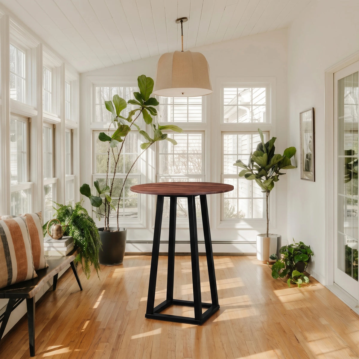 Thame Bar Table on its own in a bright sunroom