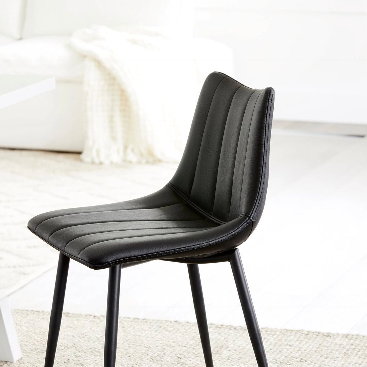 Aubusson Bar Stool Set of Two in Matte Black, styled in a living room