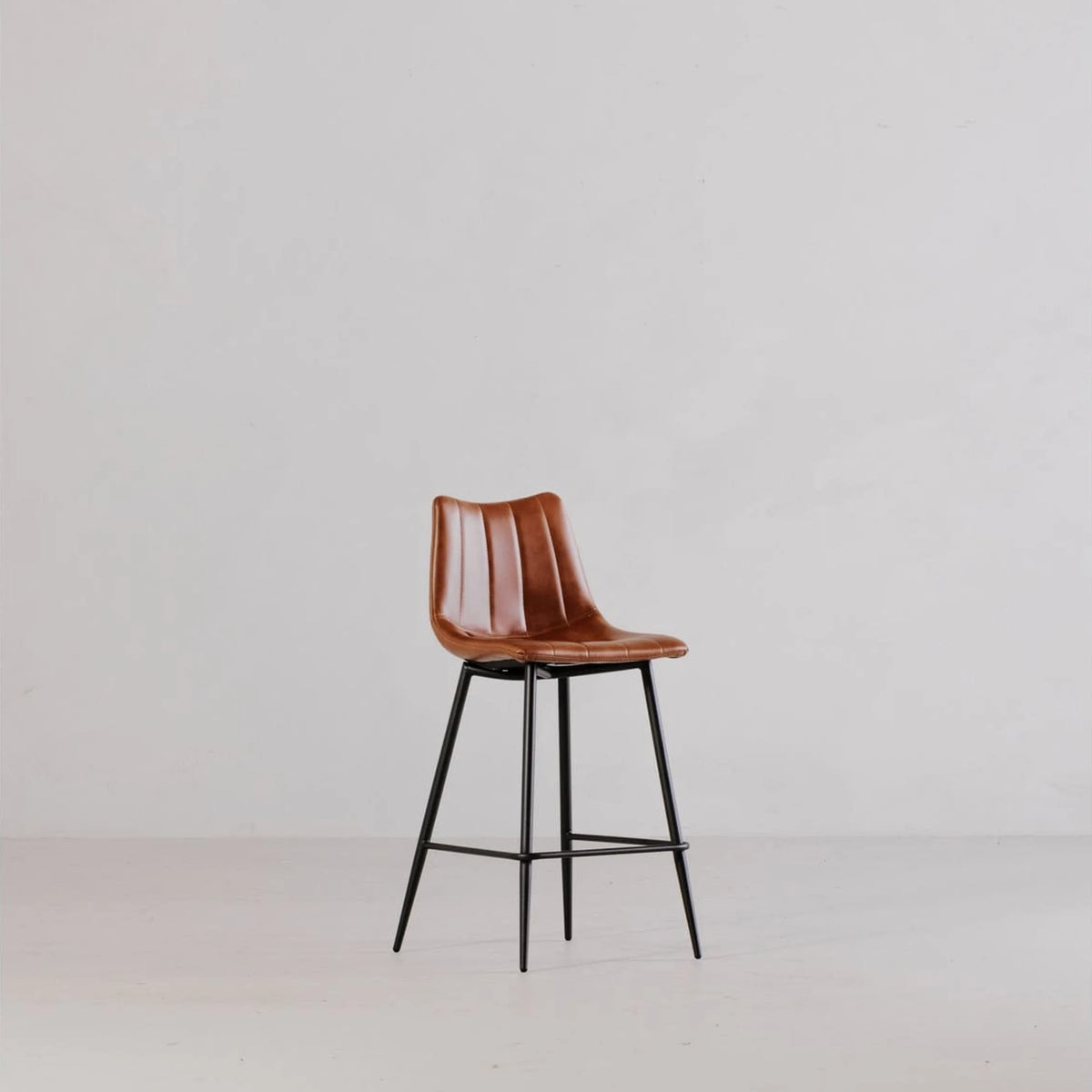 Aubusson Bar Stool Set of Two in Brown, styled in a living room
