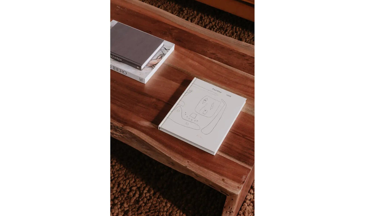 Torbay Coffee Table in Natural Brown — styled in a living room