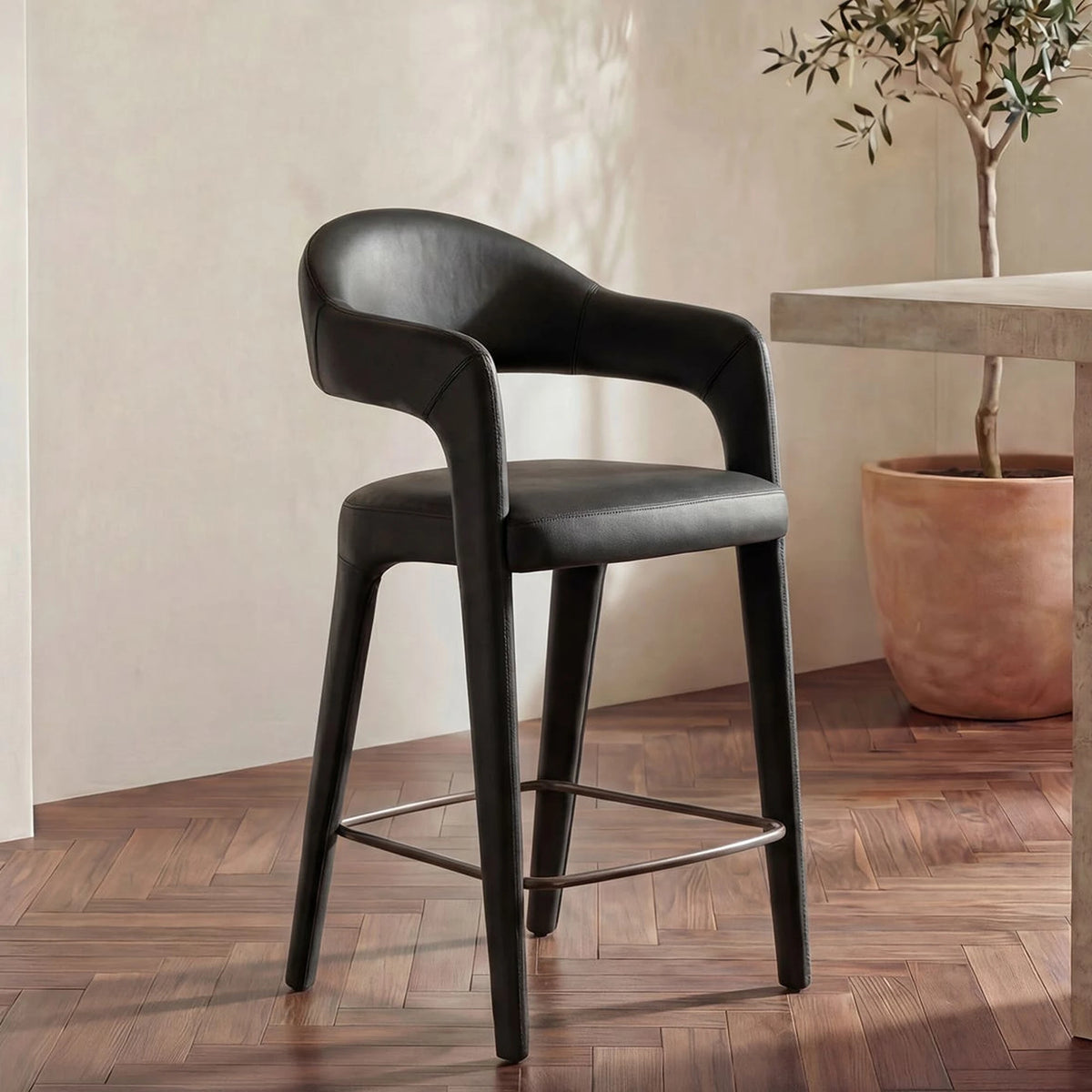 Massa Counter Stool in Black Leather, styled in a living room