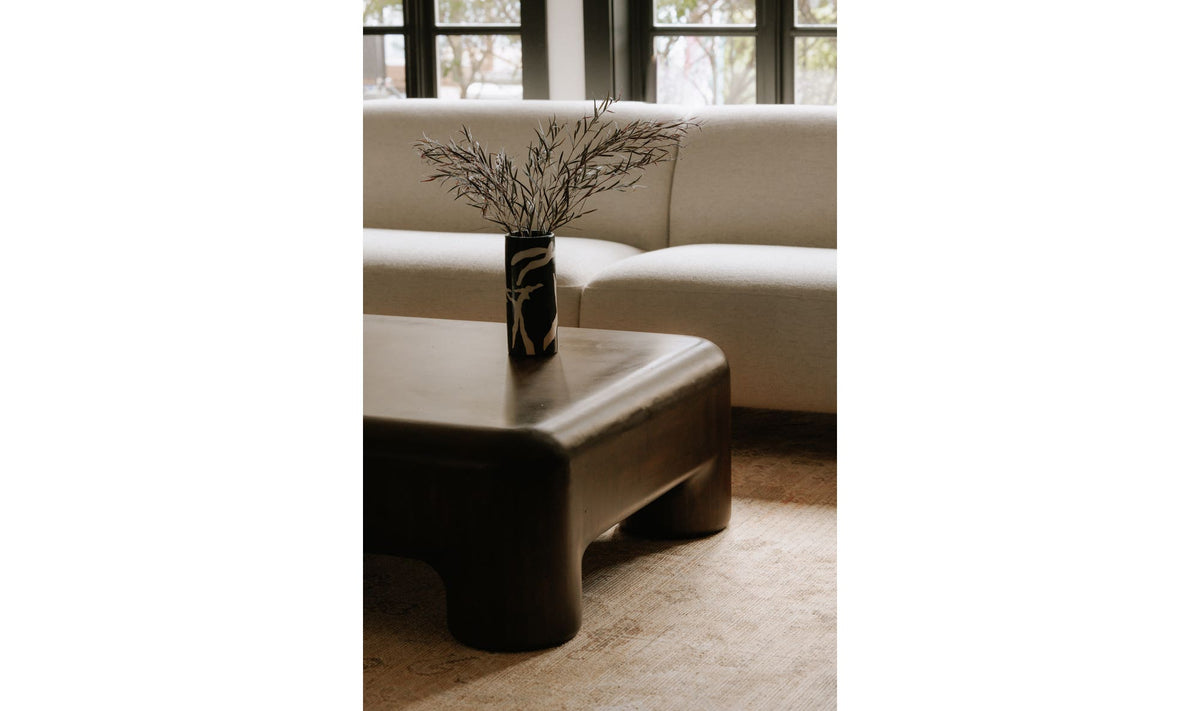 Redruth Coffee Table in Dark Brown — styled in a living room